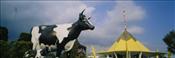 Chatty-Bell-Statue-and-HerPhotographic-Print-C12995213